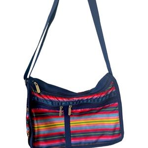 Lesportsac crossbody expandable zip closure multi pocket shoulder bag in medium